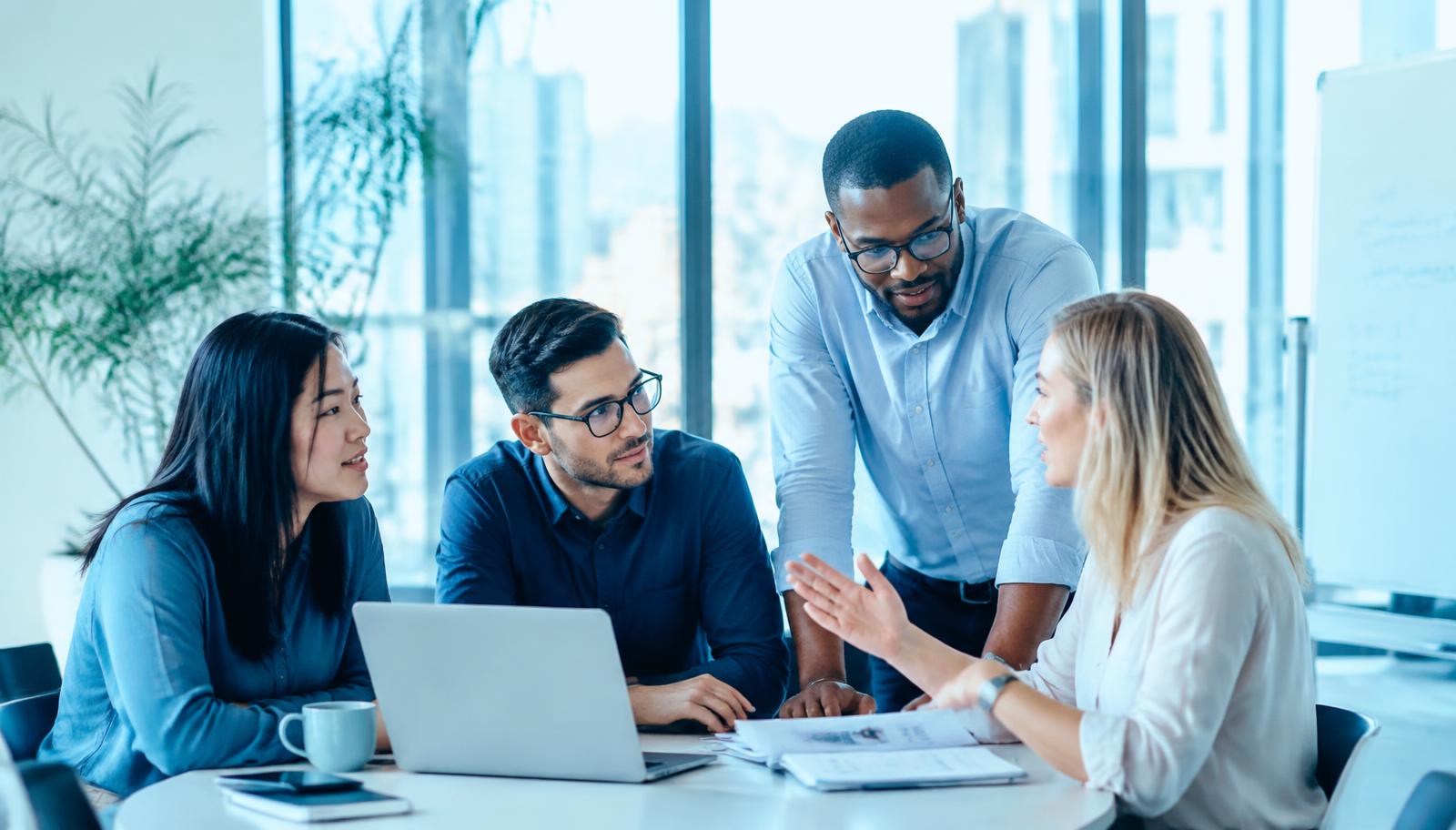Colleagues collaborating in a professional workplace